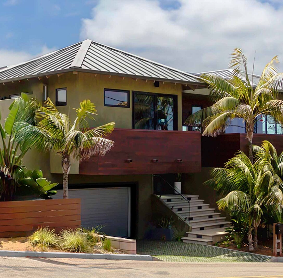 Aquasoltech metal roof systems installation on a San Diego home, showcasing durable standing seam metal roofing and architectural metal roofing solutions designed for long‑lasting protection and modern exterior appeal.