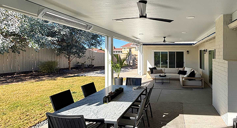 Aquasoltech demonstrating the superior look of custom aluminum patio covers and seamless gutter finishes in San Diego, showcasing high‑quality exterior home improvement results.