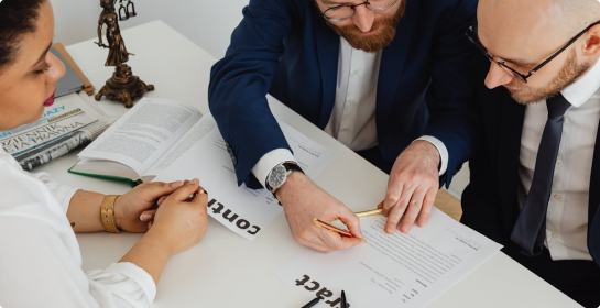 Aquasoltech team members reviewing plans together on site in San Diego during a seamless gutter and patio cover consultation, showing collaboration and professional project planning.