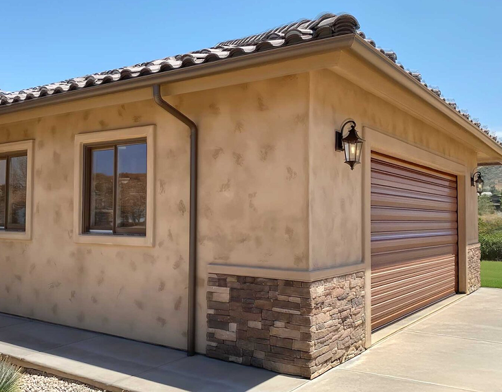 Close-up of a San Diego home with seamless gutter installation along the roofline, highlighting Aquasoltech’s professional exterior solutions and quality craftsmanship.