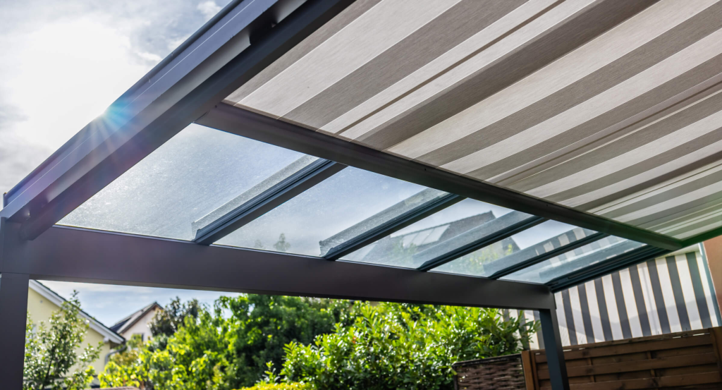 Aquasoltech patio cover installation on a residential backyard in San Diego, showcasing a sleek aluminum patio cover that enhances outdoor living space and illustrates how much a custom patio cover can cost.